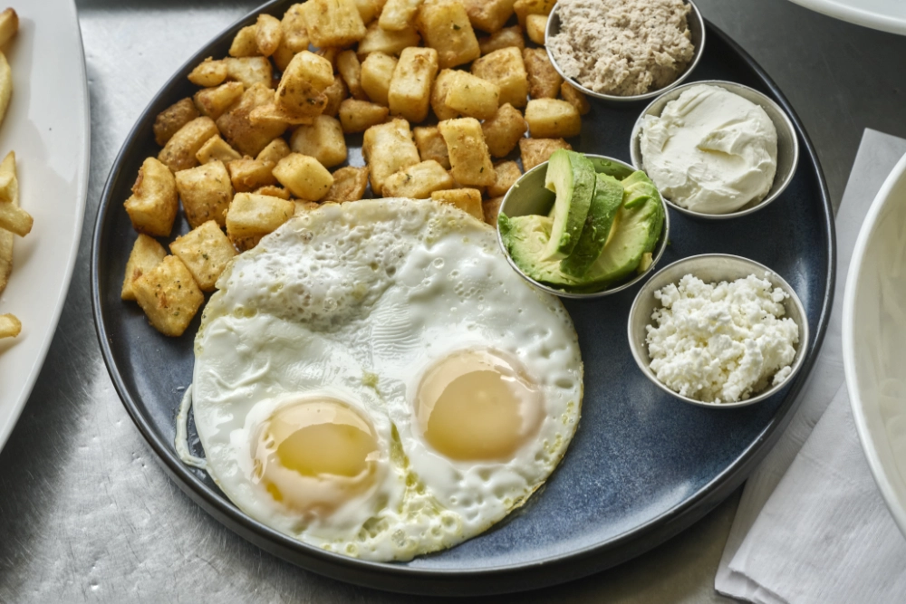 cafe sheli classic sunnyside eggs breakfast